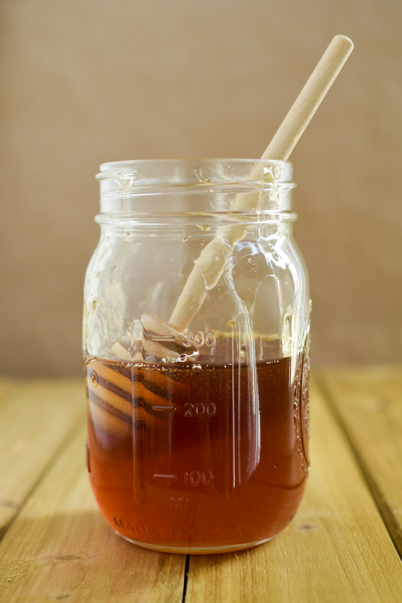 Jar of Honey with a Honey Dipper